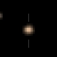 NASA опубликовало первые цветные снимки Плутона